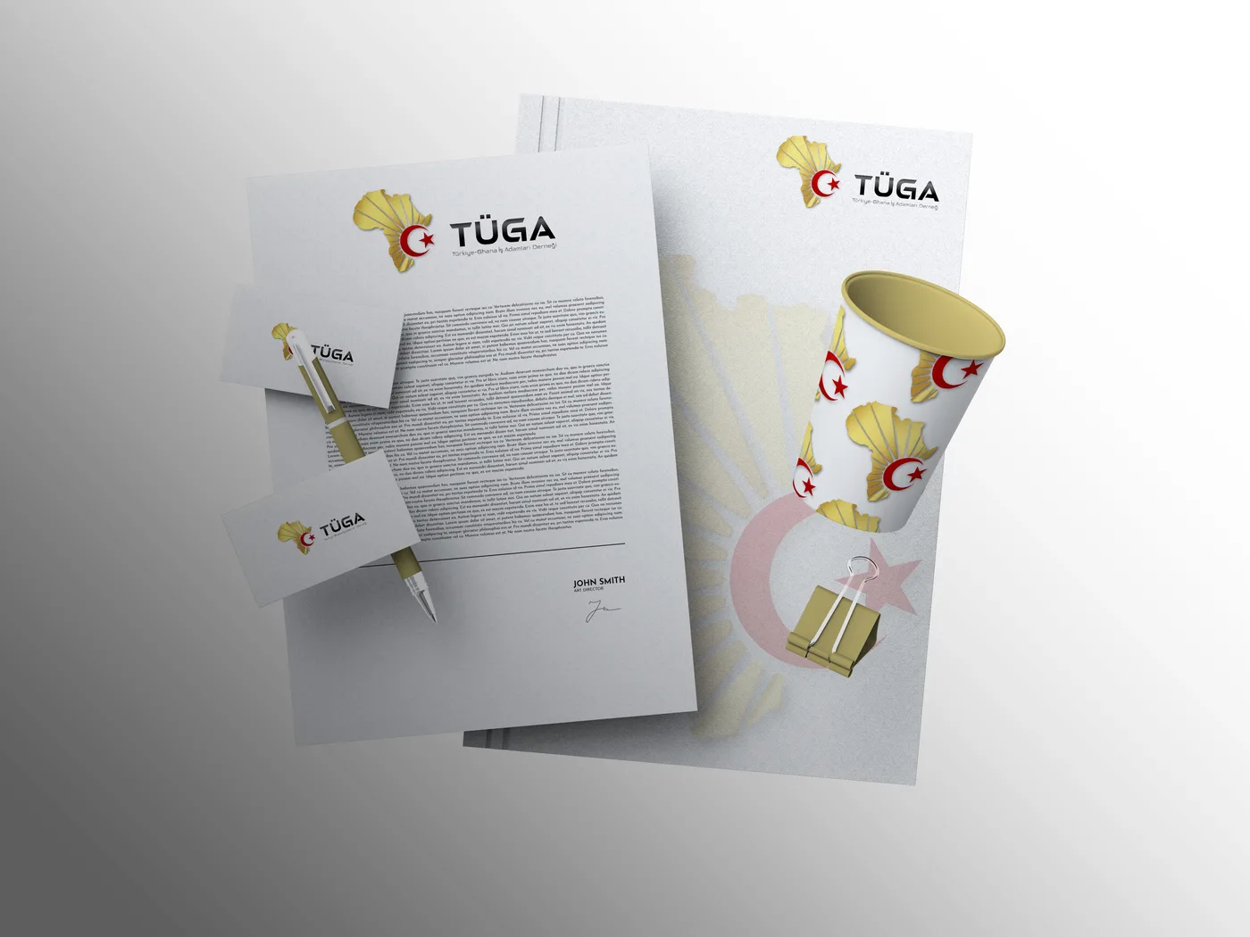 TÜGA kurumsal yazışma seti: antetli kağıt, kartvizit ve promosyon bardağı
